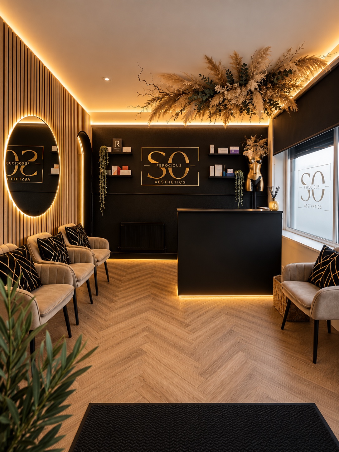 Warmly lit waiting area with seating and reception desk